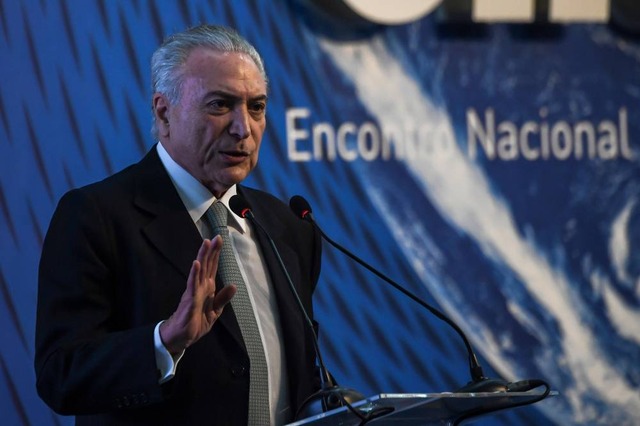 O texto sancionado mantém a meta fiscal proposta pelo governo e prevê, para 2018, um deficit primário de 131,3 bilhões de reais (Apu Gomes/AFP)